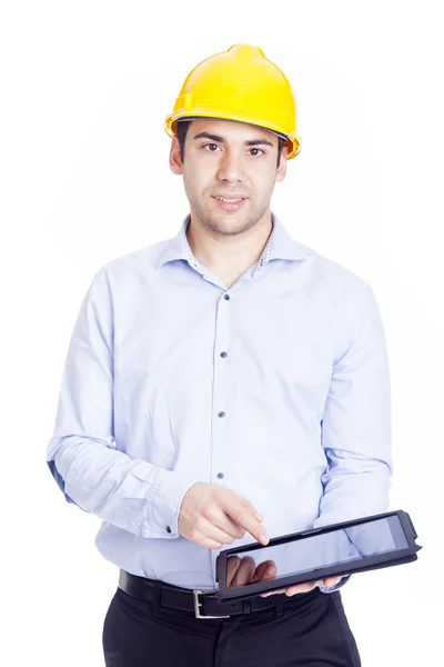 Ingeniero guapo trabajando con una tableta PC Fotos de stock