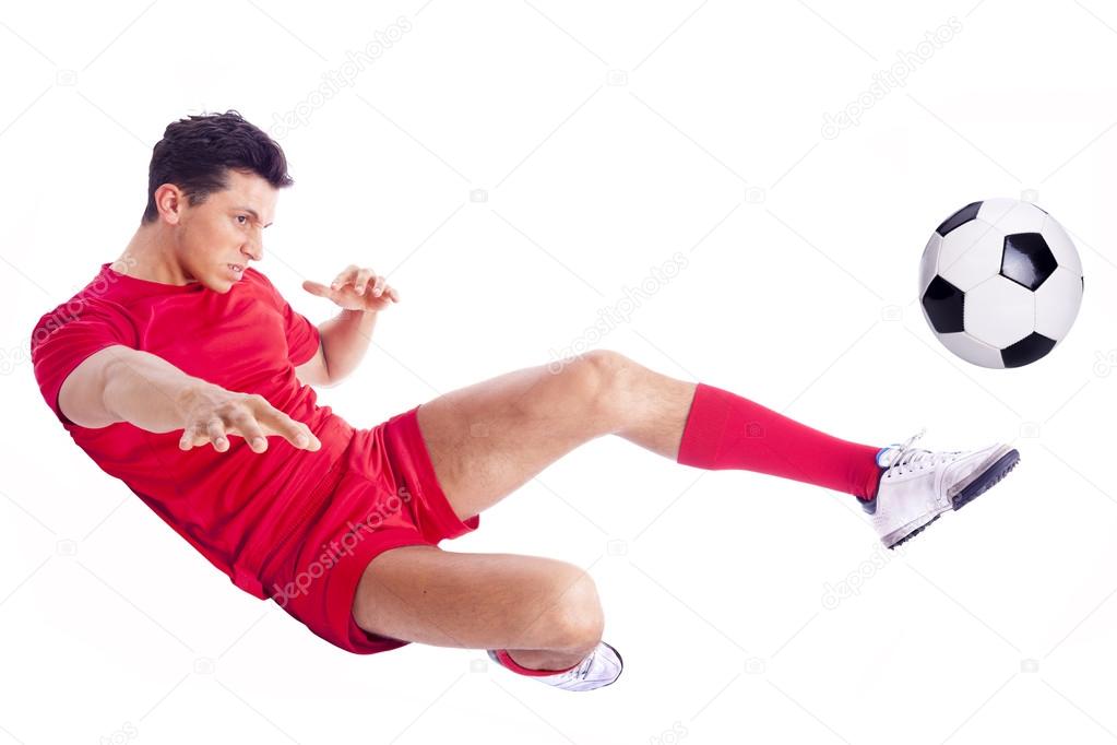 Soccer player making an acrobatic kick, isolated on white background