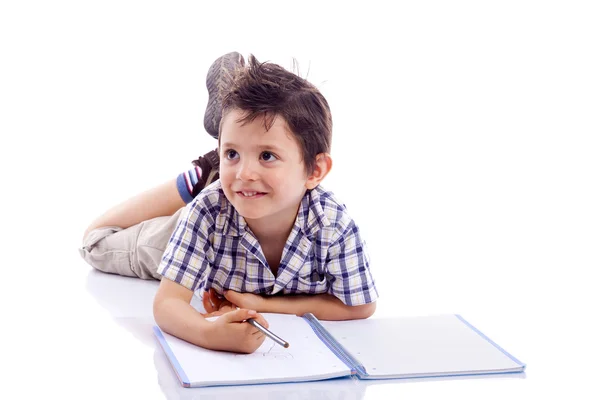 Schoolboy drawing with pencil — Stock Photo, Image