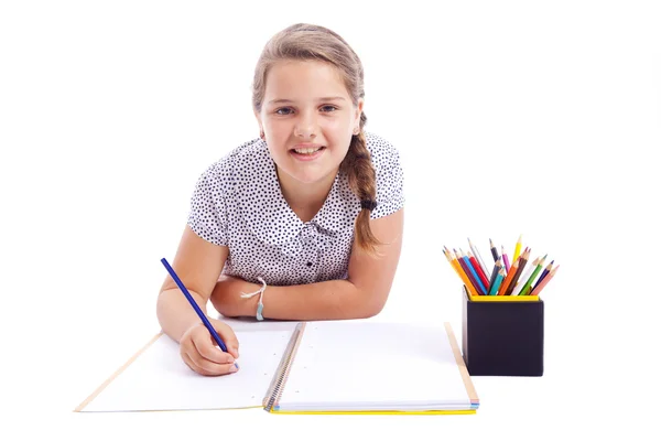 Child girl drawing with pencil, isolated on white background — Stock Photo, Image