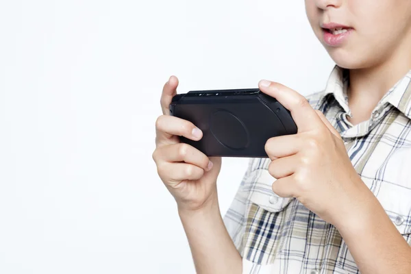 Teen boy playing video games — Stock Photo, Image