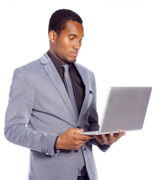 Homem de negócios com laptop — Fotografia de Stock