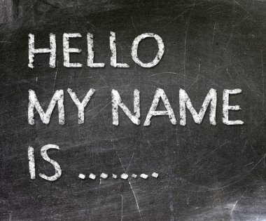 Hello My Name is .. handwritten with white chalk on a blackboard.