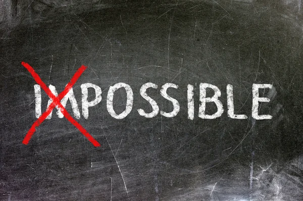 Impossible and possible option handwritten with white chalk on a blackboard. — Stock Photo, Image