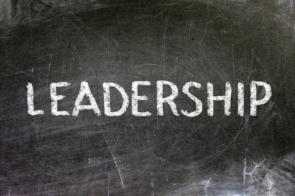 Leadership handwritten with white chalk on a blackboard. — Stock Photo, Image