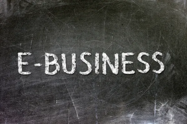 E-Business handwritten with white chalk on a blackboard. — Stock Photo, Image