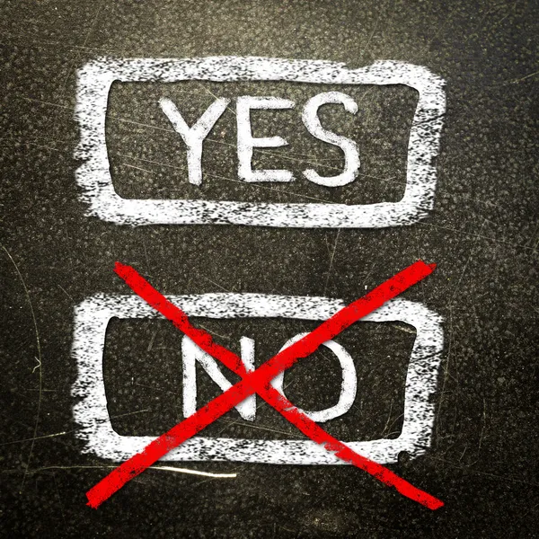 Yes or no written on the blackboard with white chalk. Your choice as a concept. — Stock Photo, Image