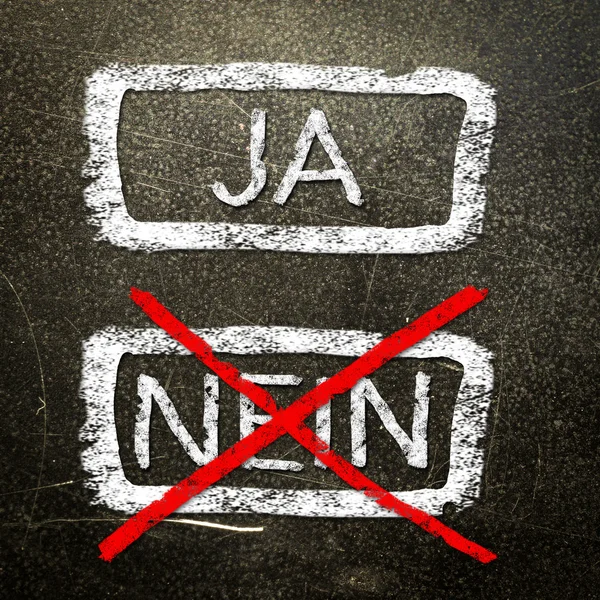 Ja or nein written on the blackboard with white chalk. Your choice as a concept. — Stock Photo, Image