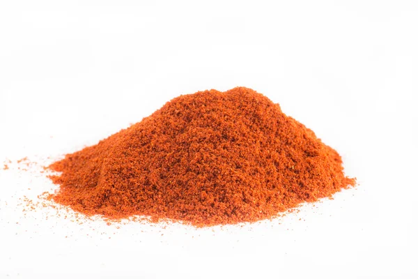 Пищевые специи груды красного грунта Paprika — стоковое фото