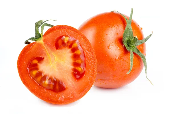 Tomatoes with green leaves isolated on white background — Stock Photo, Image