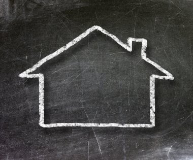 House drawn on a chalkboard with white chalk