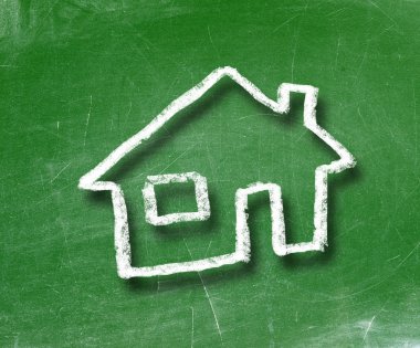 House drawn on a chalkboard with white chalk