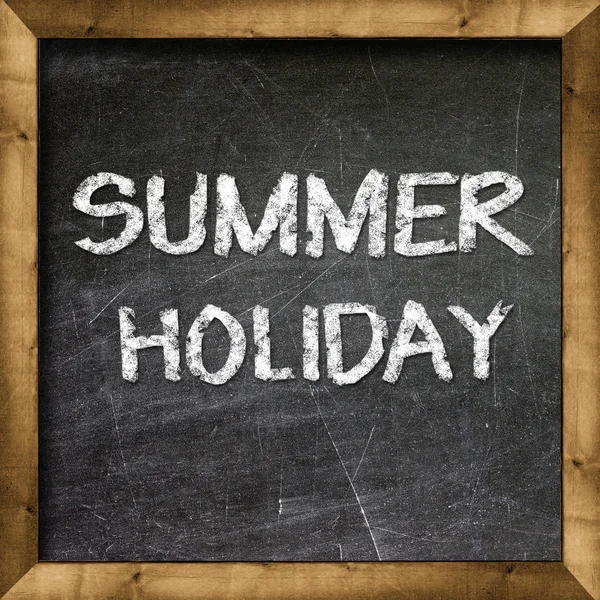 Summer holiday handwritten on blackboard — Stock Photo, Image