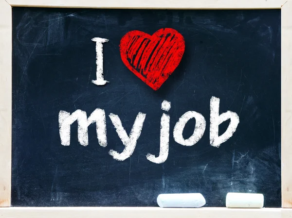 I love my job handwritten with white chalk on a blackboard — Stock Photo, Image