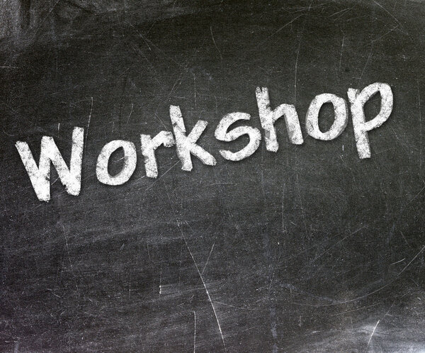 Workshop handwritten with white chalk on a blackboard