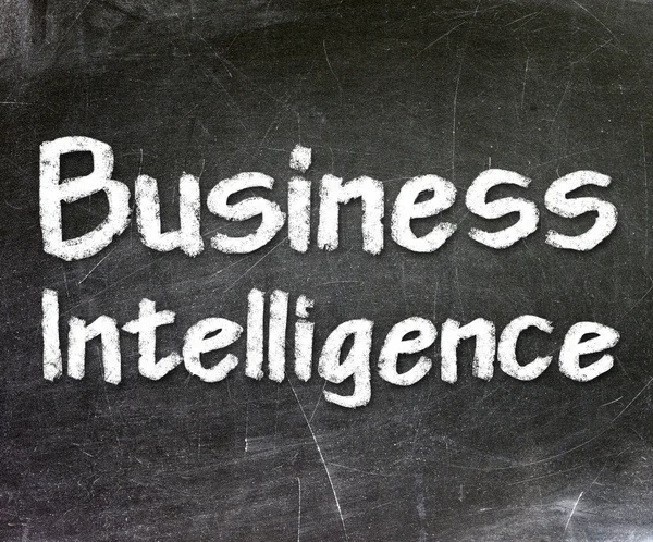 Business Intelligence handwritten with white chalk on a blackboard — Stock Photo, Image