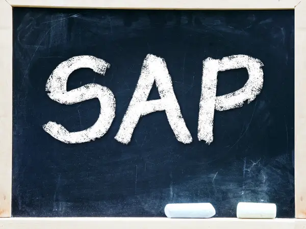 SAP handwritten with white chalk on a blackboard — Stock Photo, Image