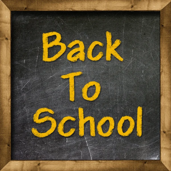 Back to school on blackboard chalkboard — Stok fotoğraf