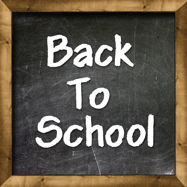 Back to school on blackboard chalkboard — Stok fotoğraf