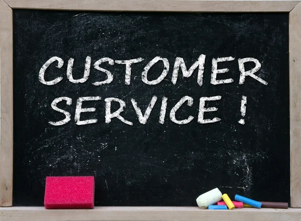 Customer service handwritten with white chalk — Stock Photo, Image