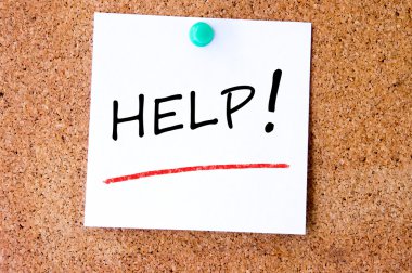 Yardım, üzerinde beyaz bir yapışkan not yazılmış