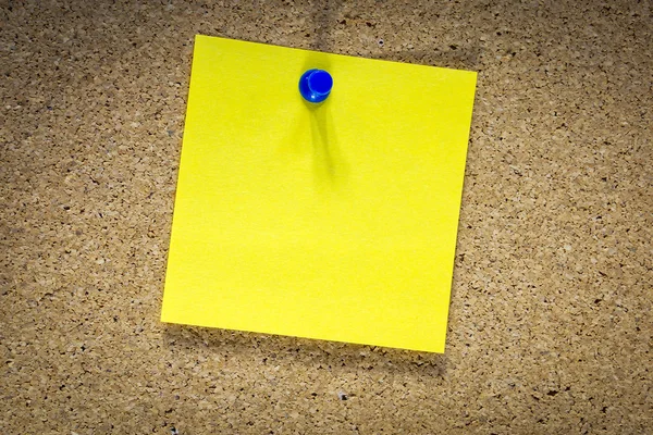 Blank yellow sticky note