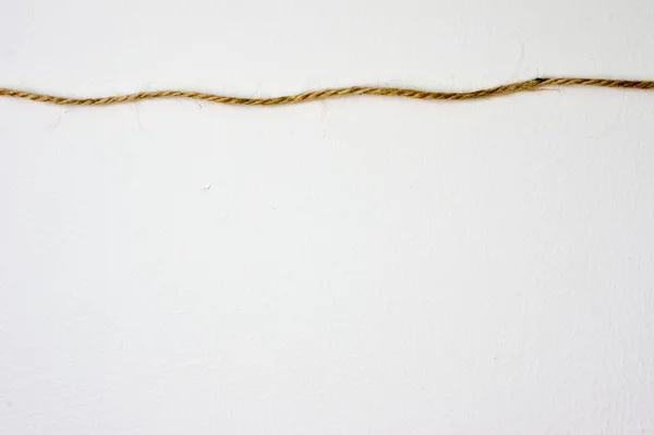 Gros plan d'une corde sur fond blanc — Photo