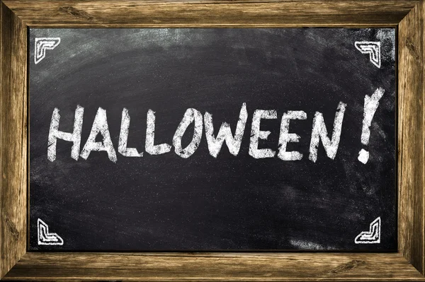 Konzeptionelle Halloween-Werbung auf schwarzer Tafel. — Stockfoto