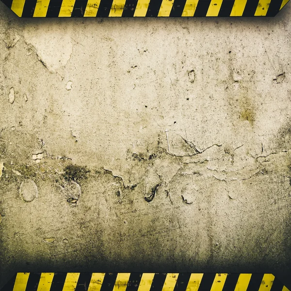 Grunge metal plate with warning stripes — Stock Photo, Image