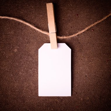 Not ve grunge bez arka plan üzerinde elbise peg