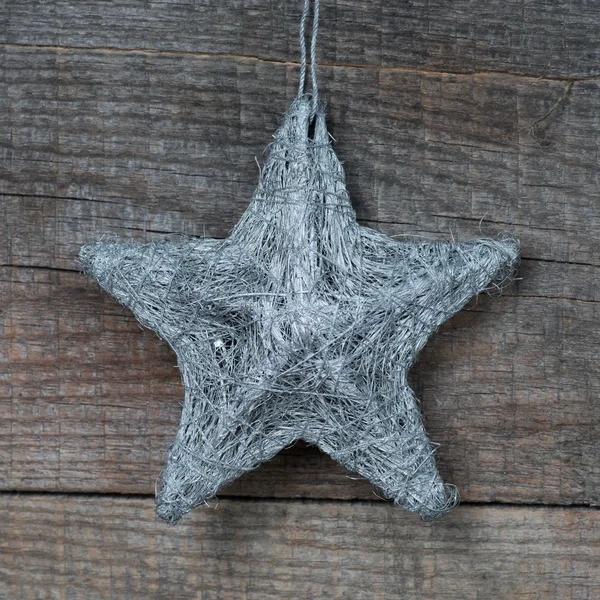 Estrella sobre fondo de madera — Foto de Stock