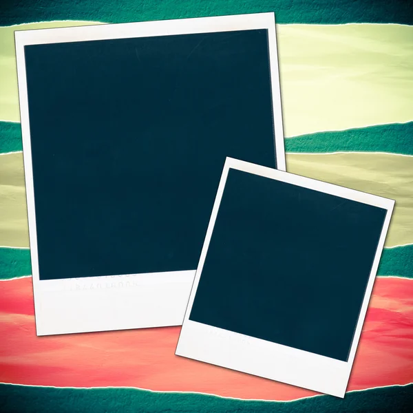 Blank photo frames on a colored background — Stock Photo, Image