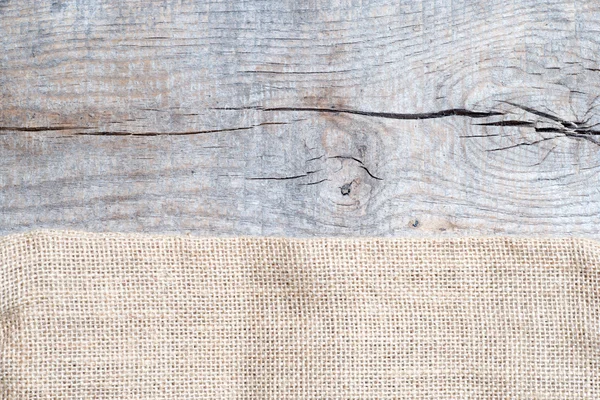Texture di iuta su tavolo di legno — Foto Stock