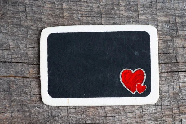 Love heart symbol on a blackboard — Stock Photo, Image