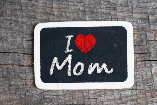 I love my mom phrase handwritten on the school blackboard — Stock Photo, Image