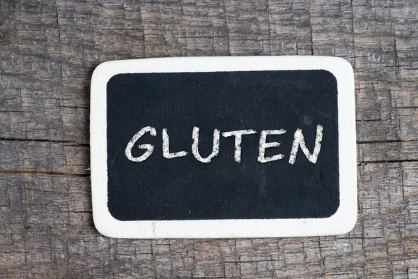 El yazısıyla yazılmış bir yazı tahtası Beyaz tebeşir ile gluten — Stok fotoğraf