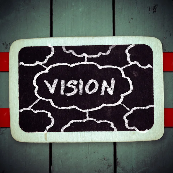 Vision handwritten with white chalk on a blackboard — Stock Photo, Image