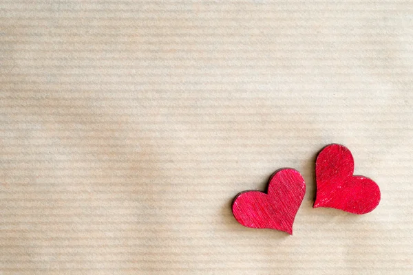 Red hearts on old paper Stock Image
