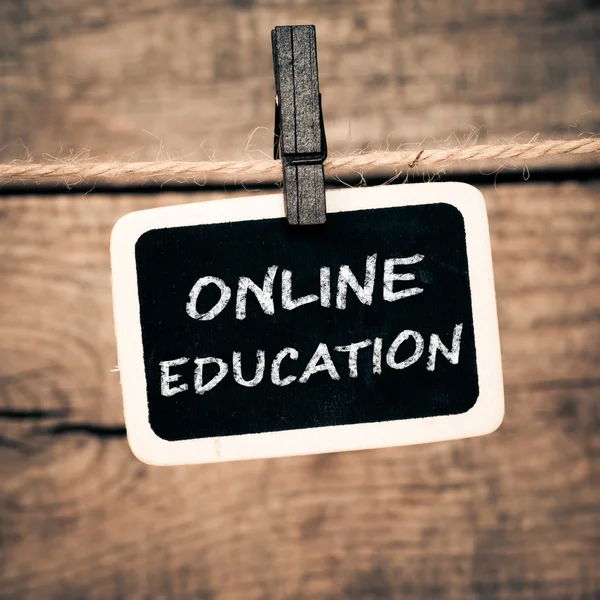 Online education handwritten with white chalk — Stock Photo, Image