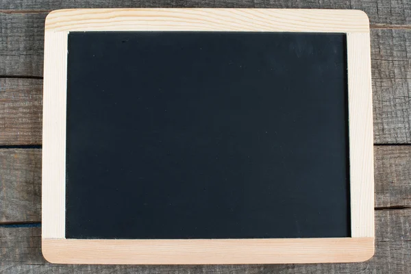 Small blackboard hanging on wooden — Stock Photo, Image
