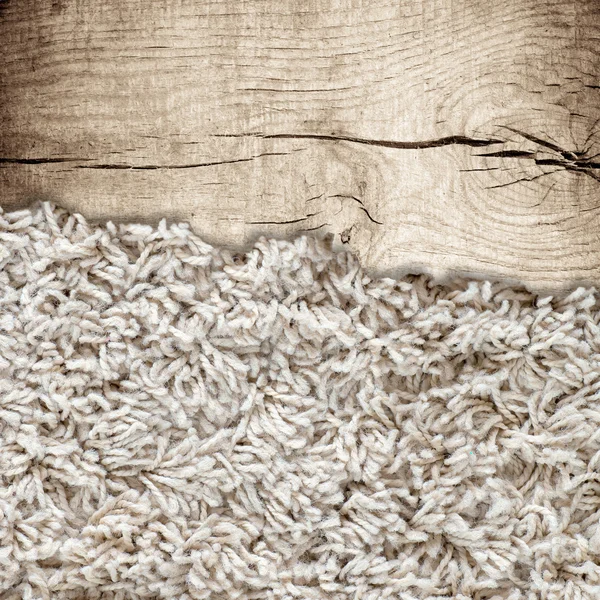 Textura de madeira com tapete — Fotografia de Stock