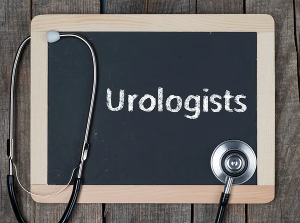 Blackboard with word Urologists and stethoscope — Stock Photo, Image