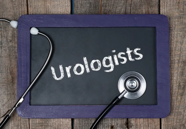 Blackboard with word Urologists and stethoscope — Stock Photo, Image