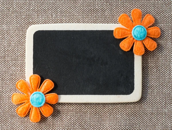 Blackboard with flower — Stock Photo, Image