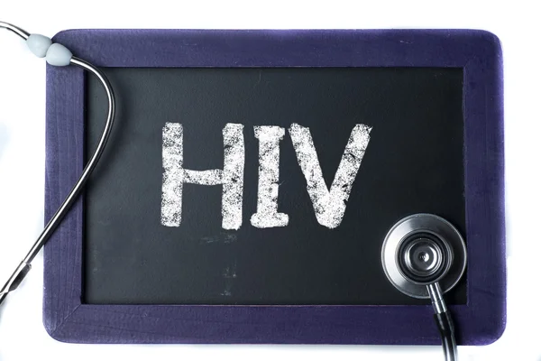 Blackboard ile word HIV ve stetoskop — Stok fotoğraf