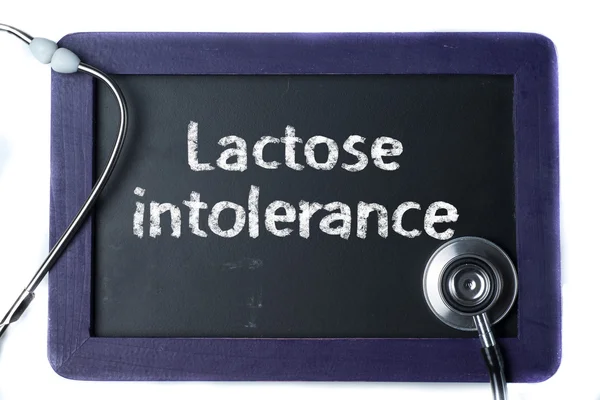 Blackboard with word Lactoseintolerance and stethoscope — Stock Photo, Image