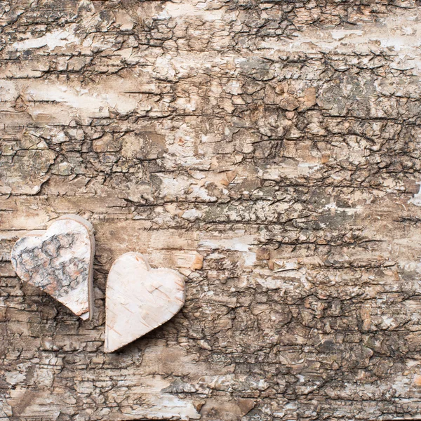 Corazón sobre fondo de madera . — Foto de Stock