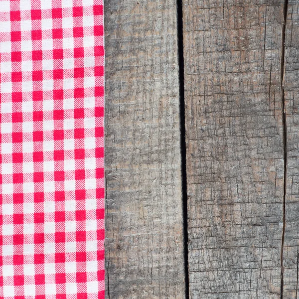Tablecloth textile texture on wooden table — Stock Photo, Image