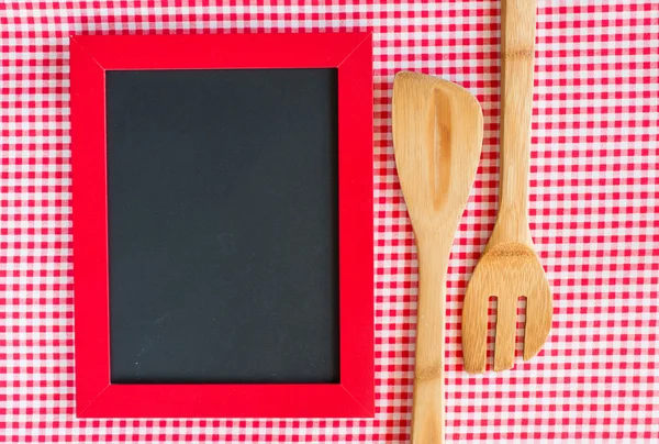 Menu blackboard with wooden spoon and fork — Stock Photo, Image