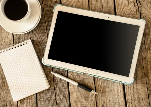 Empty tablet pc and a coffee and notebook with pen — Stock Photo, Image